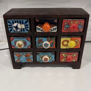 vintage wooden apothecary cabinet or spice rack